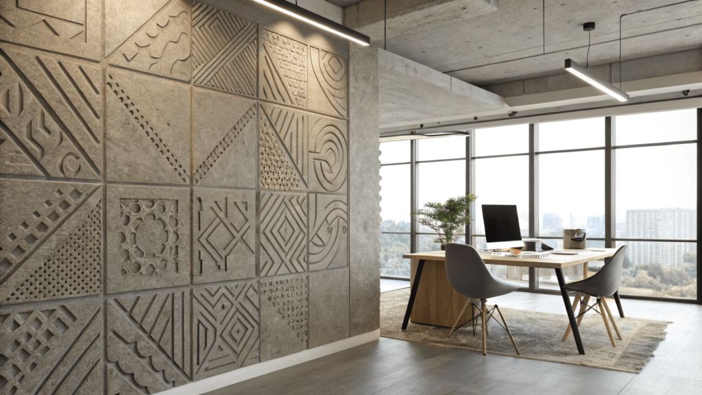 Office with textured concrete wall featuring geometric patterns]